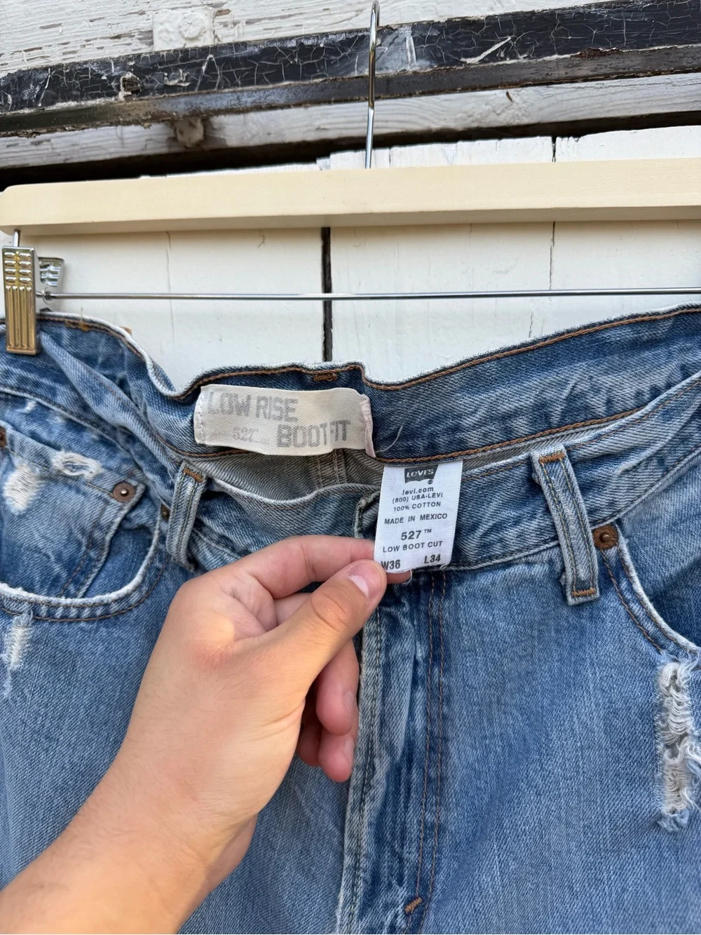 Levi's Medium Blue Bootcut Jeans with Distressed Hem